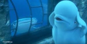 An animated scene from the Pixar film "Finding Dory." Underwater scene where a beluga whale has his fins to his head trying to use echolocation. A whale shark is next to him watching.